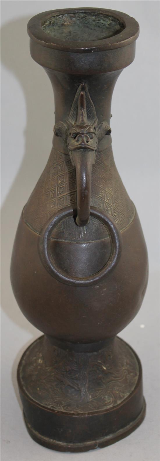 A large Chinese bronze hu vase, Yuan Dynasty, 38.5cm, foot mis-shapen